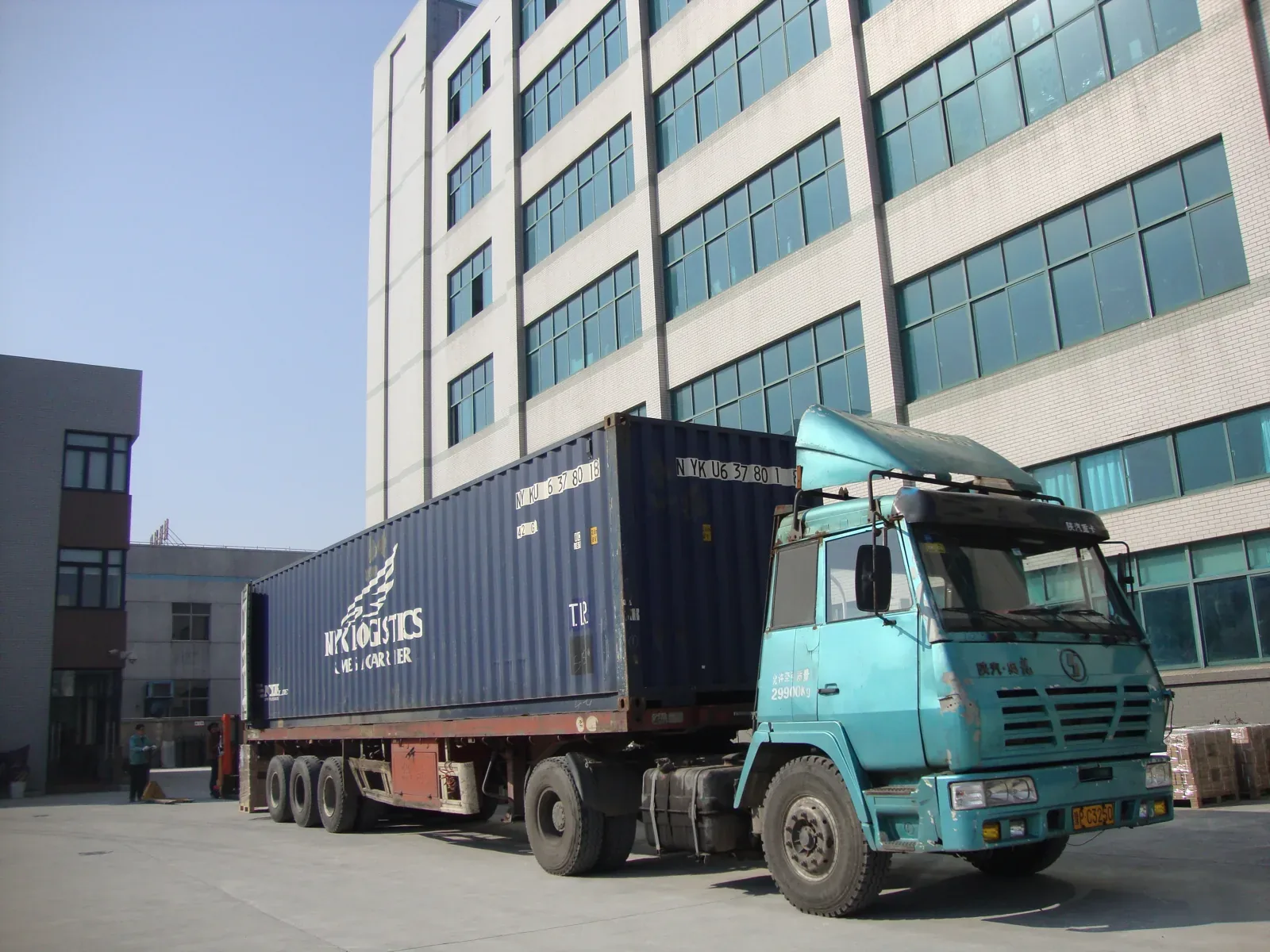 Container truck leaving the gas spring factory