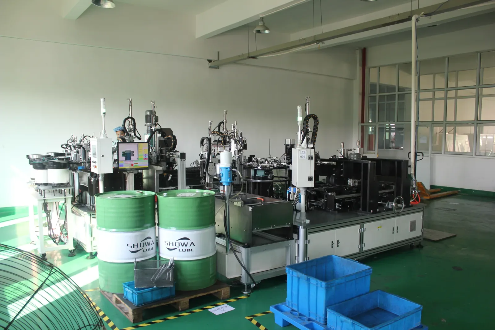 Automated gas spring assembly line with bowl feeders at LX Gas Spring